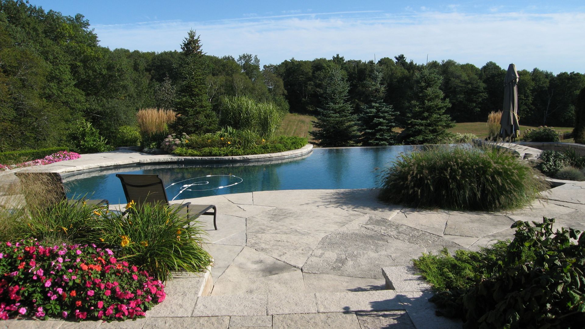How to Landscape Around Your Swimming Pool This Spring