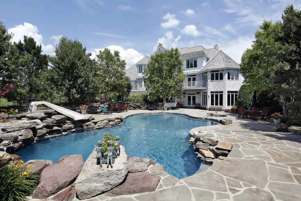 A large home and extravagant pool designed and built using a HFS Finacial loan.