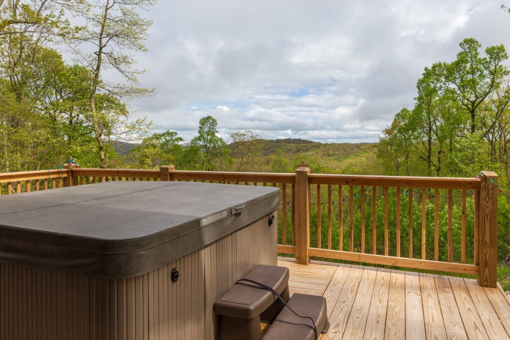 Hot Tub financed by HFS Financial on top of a wood deck overlooking a forest