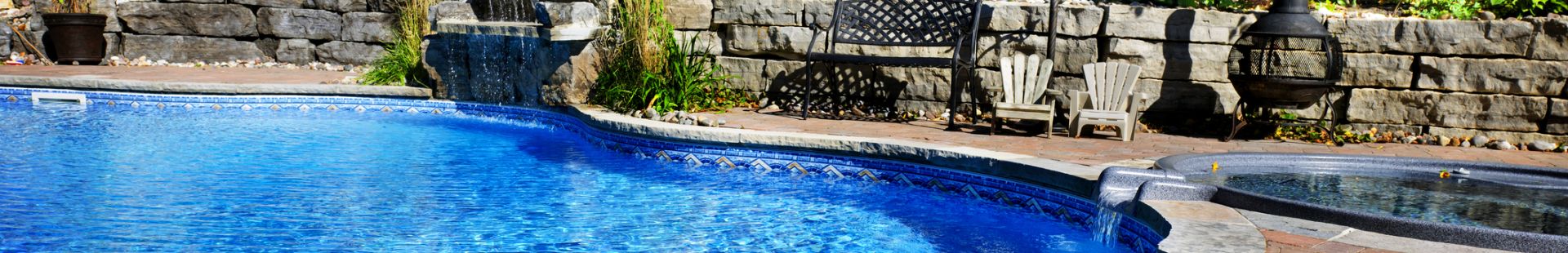 Inground pool financing: pool with spa in backyard