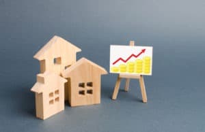 Three little wooden houses near home value graph