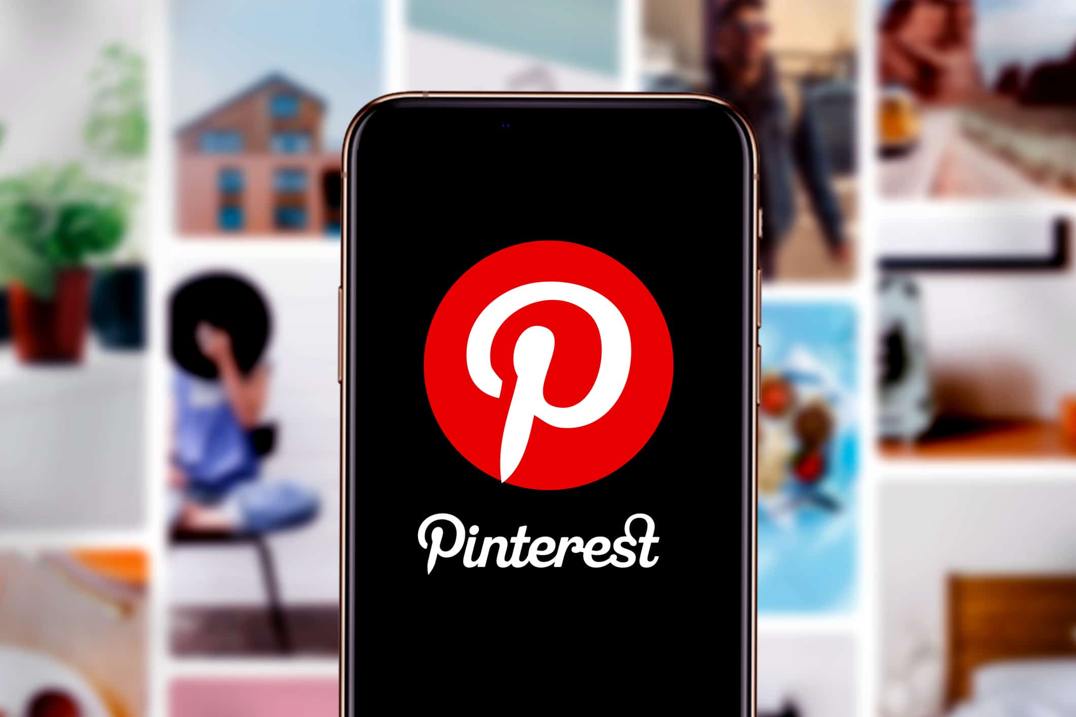 Cell phone displaying pinterest for marketing