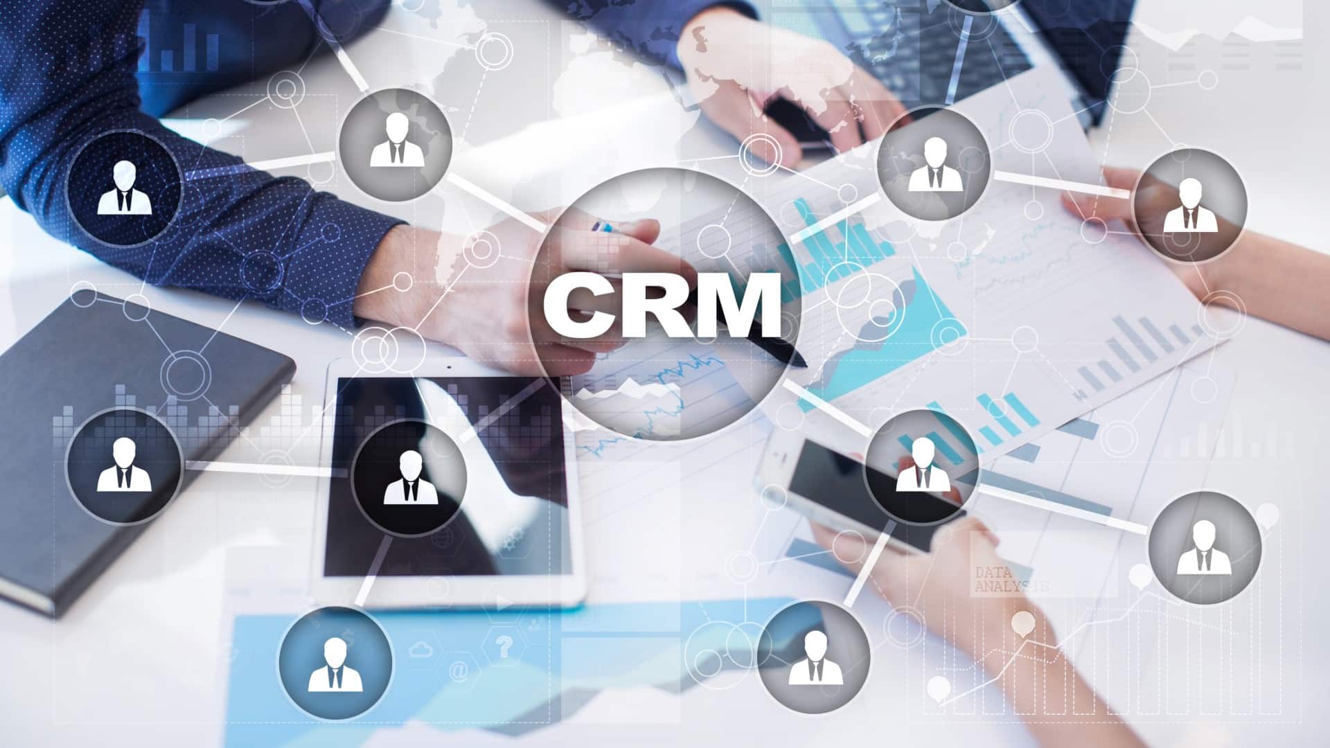 two people looking at CRM data