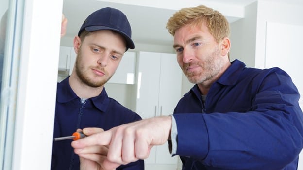 Apprentice being taught contractor business