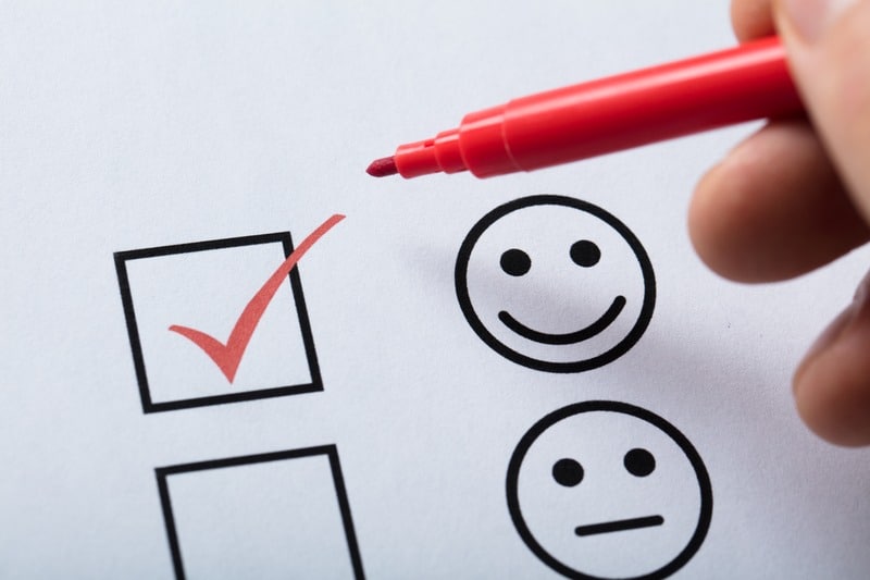 A customer chooses a smiley face over a frown face on a customer service review. This business must have used our customer service tips for contractors!