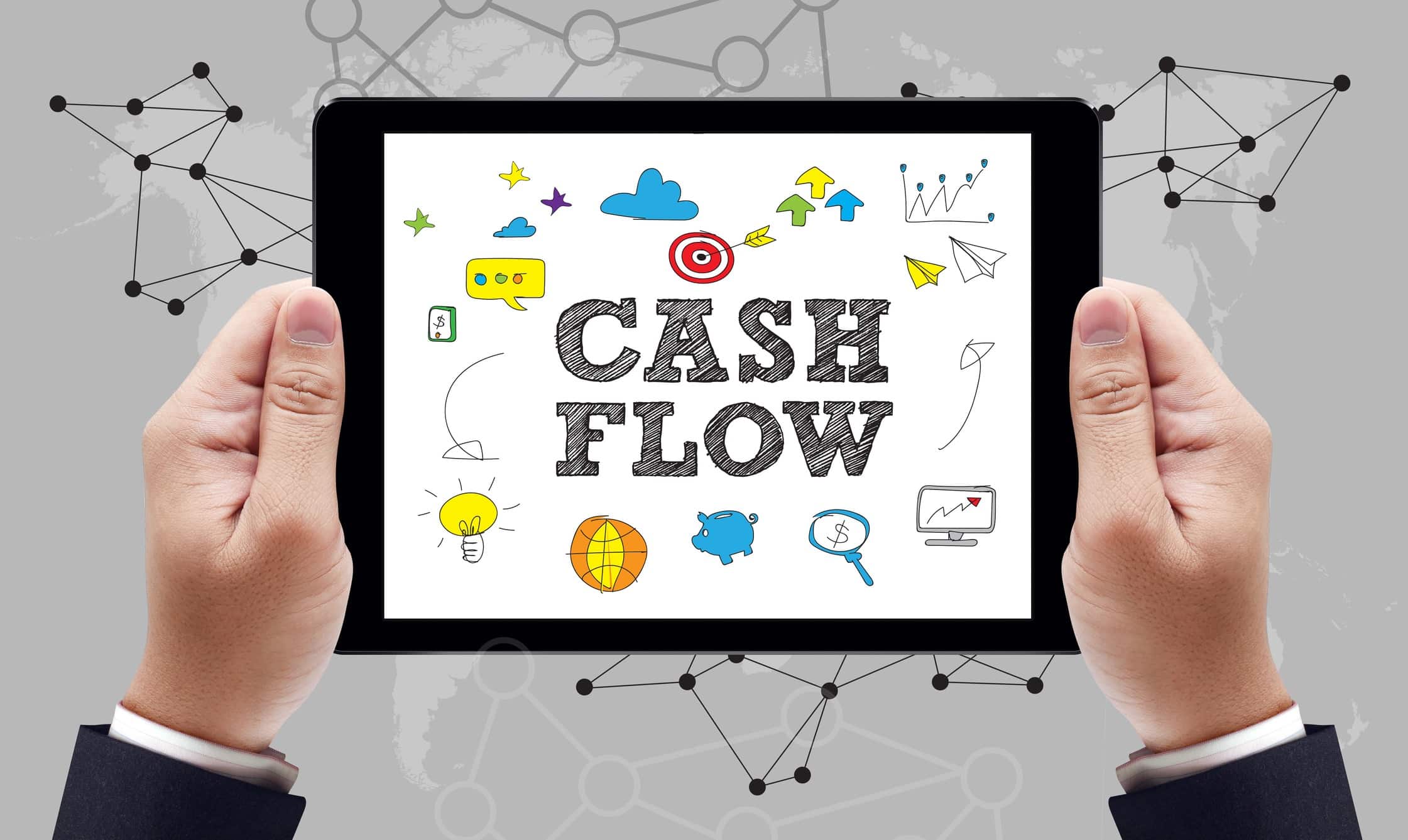 Man holding tablet with cash flow diagram