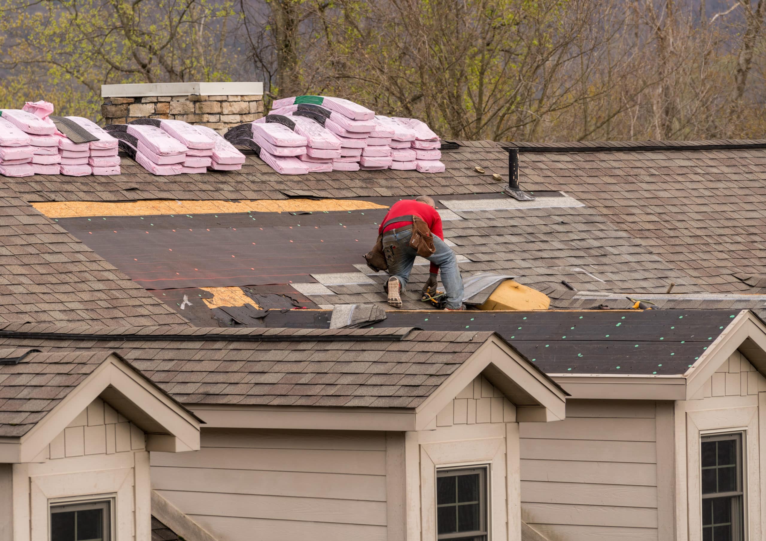 subcontractors install a new roof