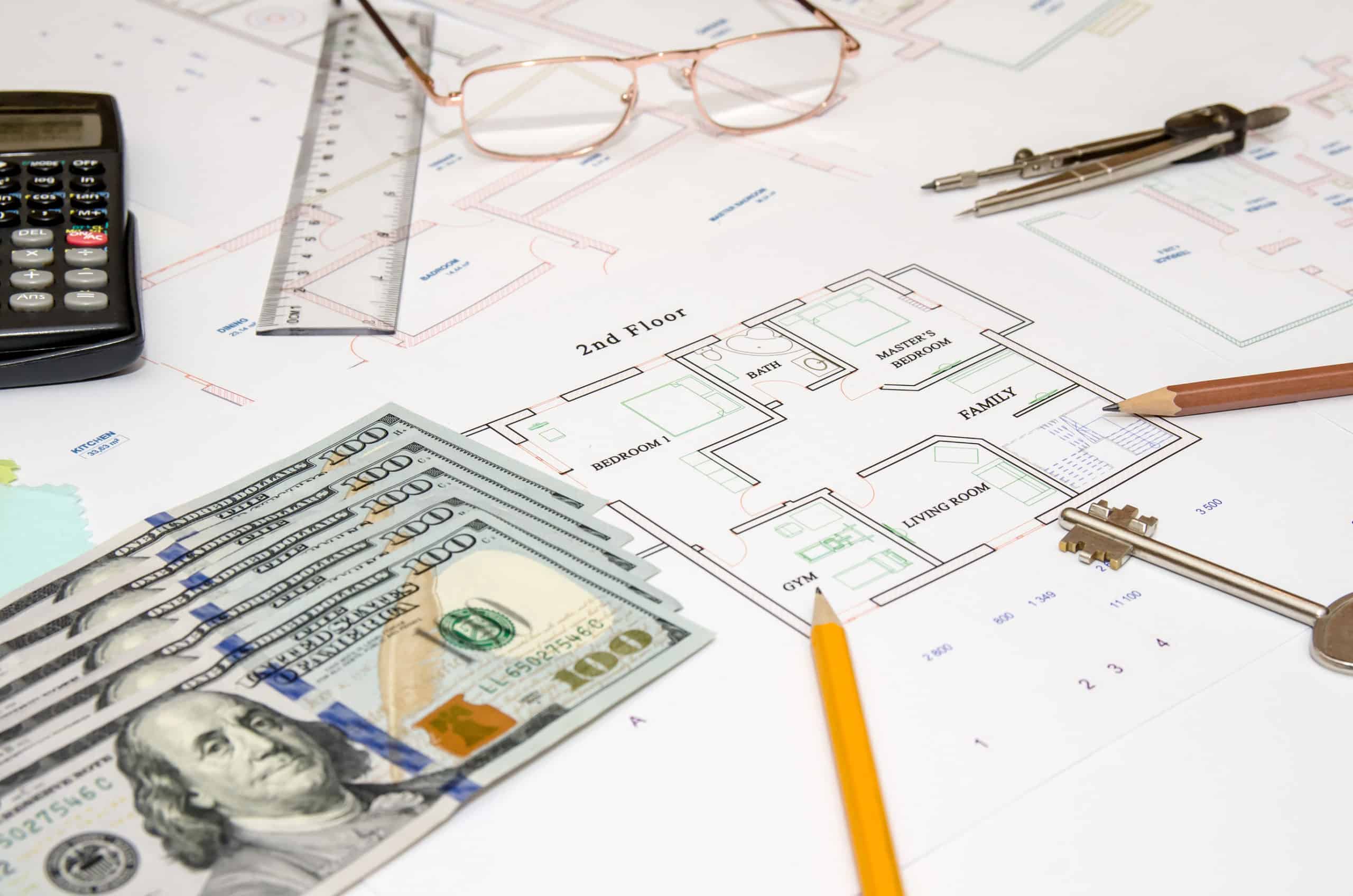 A calculator, a ruler, glasses, a compass, a key, two pencils, and some cash are sitting on top of a blueprint to help consider the question, "how to offer construction funding?"