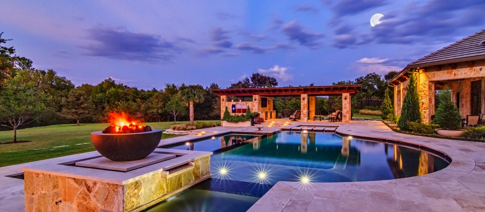 Gorgeous backyard pool with flame brazier