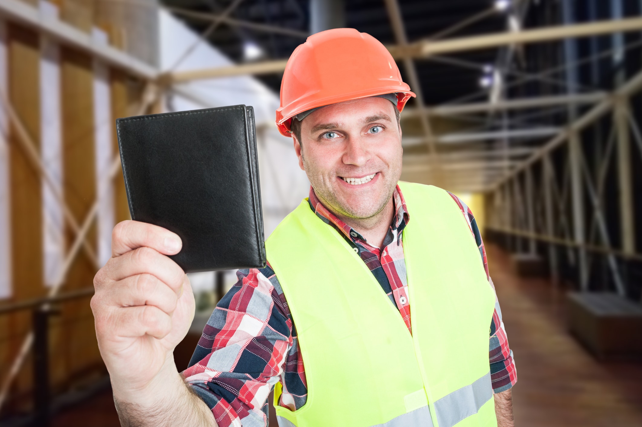 Contractor holding wallet
