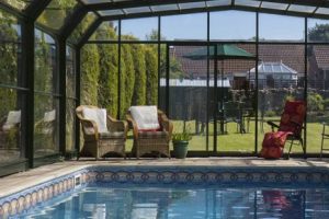 Backyard pool with premium pool enclosure installed