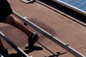 contractors installing solar panels